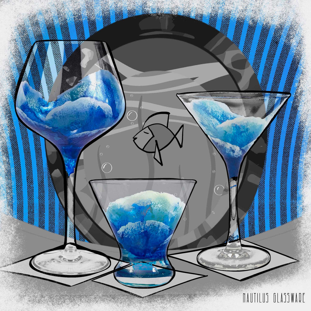 A closeup of a 3 hand painted glasses - a martini, a stemless martini, and a tall elegant wine glass - all painted to look like ocean waves from above.