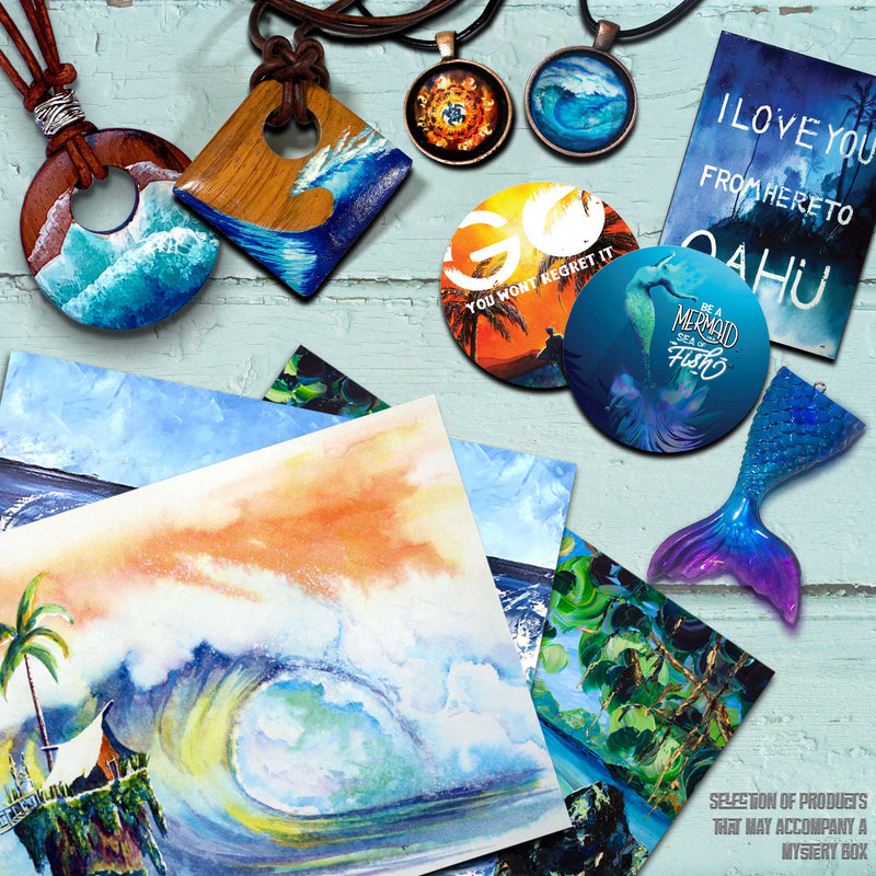 Handmade and hand-painted jewelry, art prints, stickers and mermaid keychains from 5th & Rugged's Secrets of the Lost Lagoon Mystery Box, showcasing coastal-inspired designs.