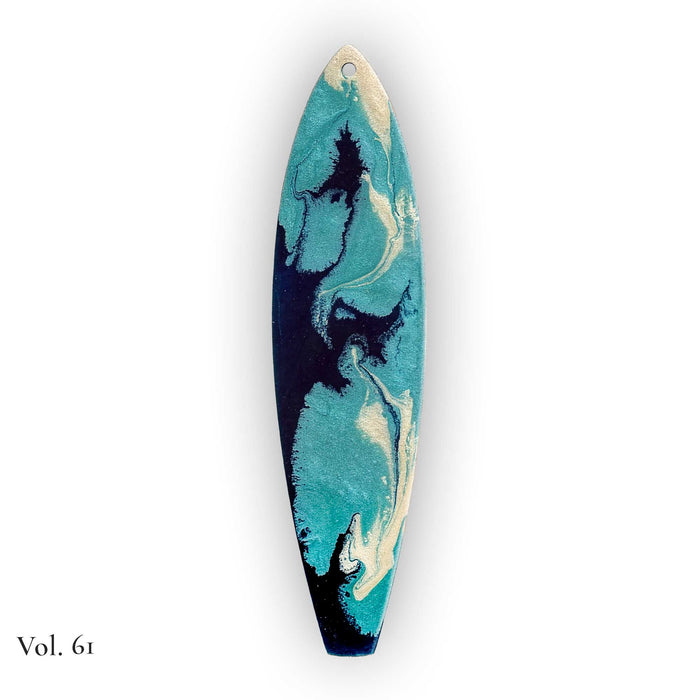 hand painted by the sea surfboard ornament with flowing pebeo resin in deep blue, aqua, and pearl