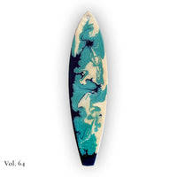 hand painted by the sea surfboard ornament with swirling ocean-like resin patterns in teal, blue, and pearl