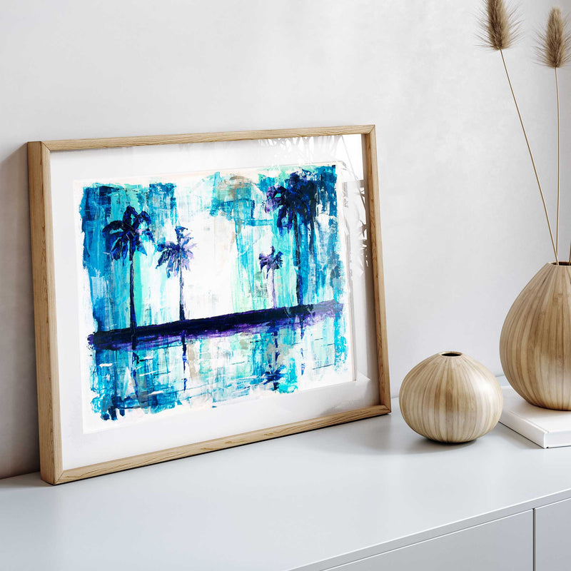 Framed Capsule Tale 19 blue palm reflection painting displayed in modern neutral interior with light wood frame and white mat