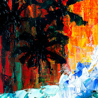 Dark palm tree silhouettes against fiery red and orange tropical sunset background