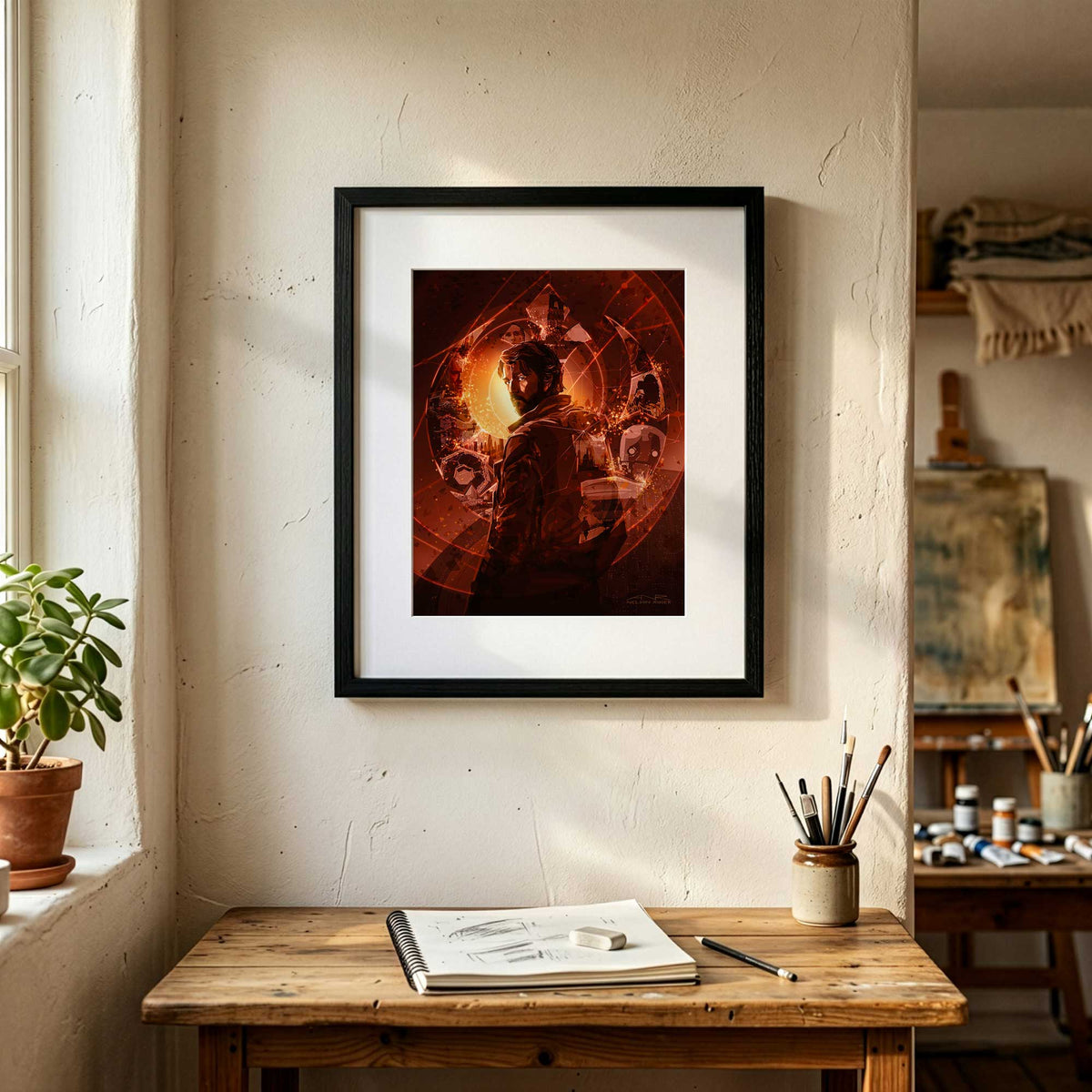 Framed Cassian Andor art print displayed in warm minimalist interior setting near an art studio