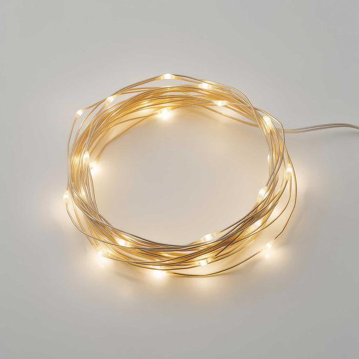 Warm White Fairly Lights on a white surface