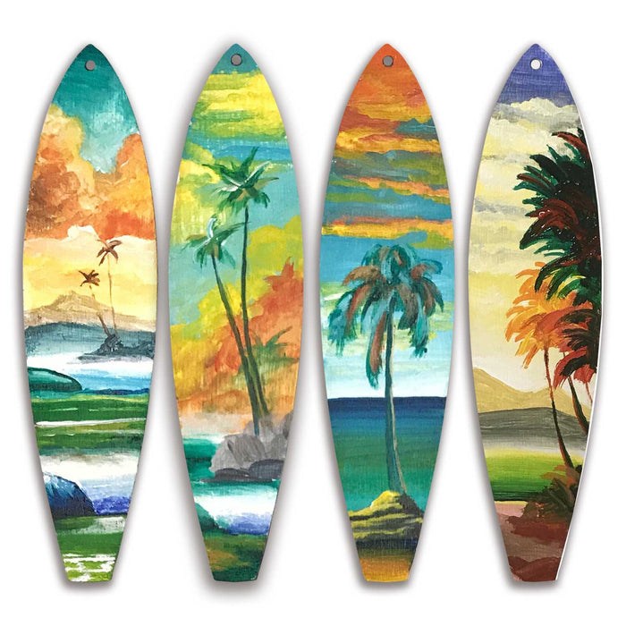 Hand-painted Hawaiian Holiday surfboard ornaments featuring tropical coastal scenes with palm trees, ocean waves, and layered sunset colors