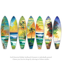 A selection of Hawaiian Holiday wooden surfboard ornaments showcasing tropical shoreline scenes with palm trees, ocean waves, and sunset skies