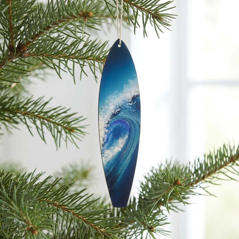 Big Blue surfboard ornament hanging on christmas tree