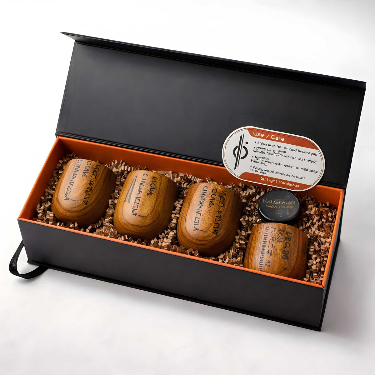 Kar’tam wooden tea cup set packaged in presentation box with protective paper fill, care card, and included wood polish for maintenance