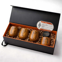 Kar’tam wooden tea cup set packaged in presentation box with protective paper fill, care card, and included wood polish for maintenance