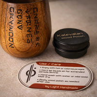 Handcrafted wooden Kar’tam tea cup with wood polish tin and care card, showing proper care and maintenance for long-lasting use