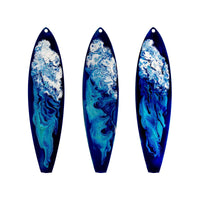 3 different variations of the Kauai surfboard holiday ornament