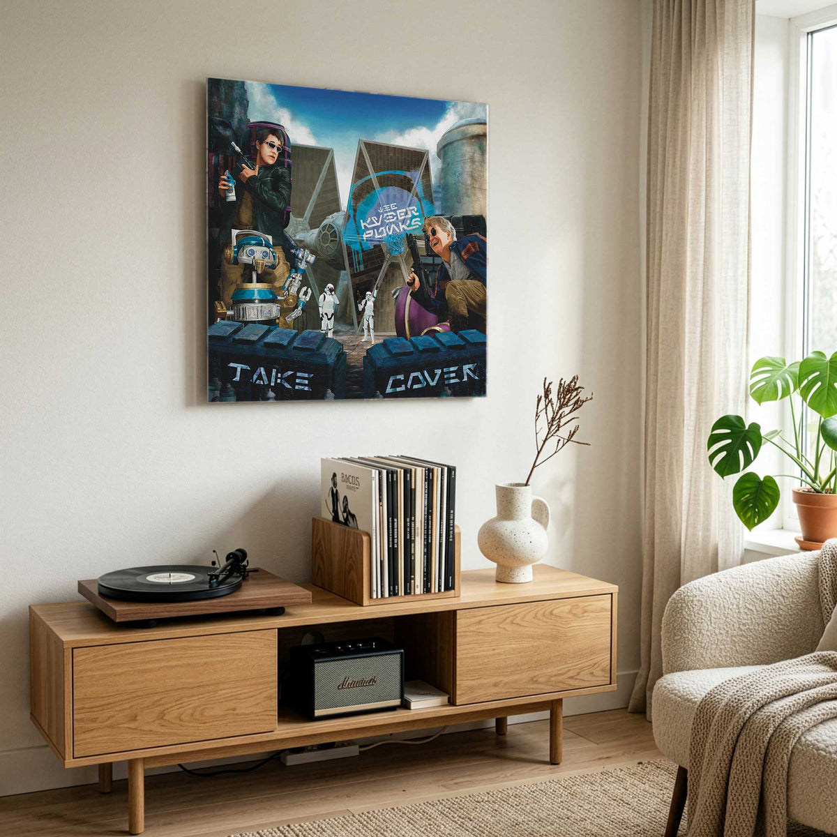 Kyberpunks Take Cover album art displayed in modern coastal living room with record player and natural light