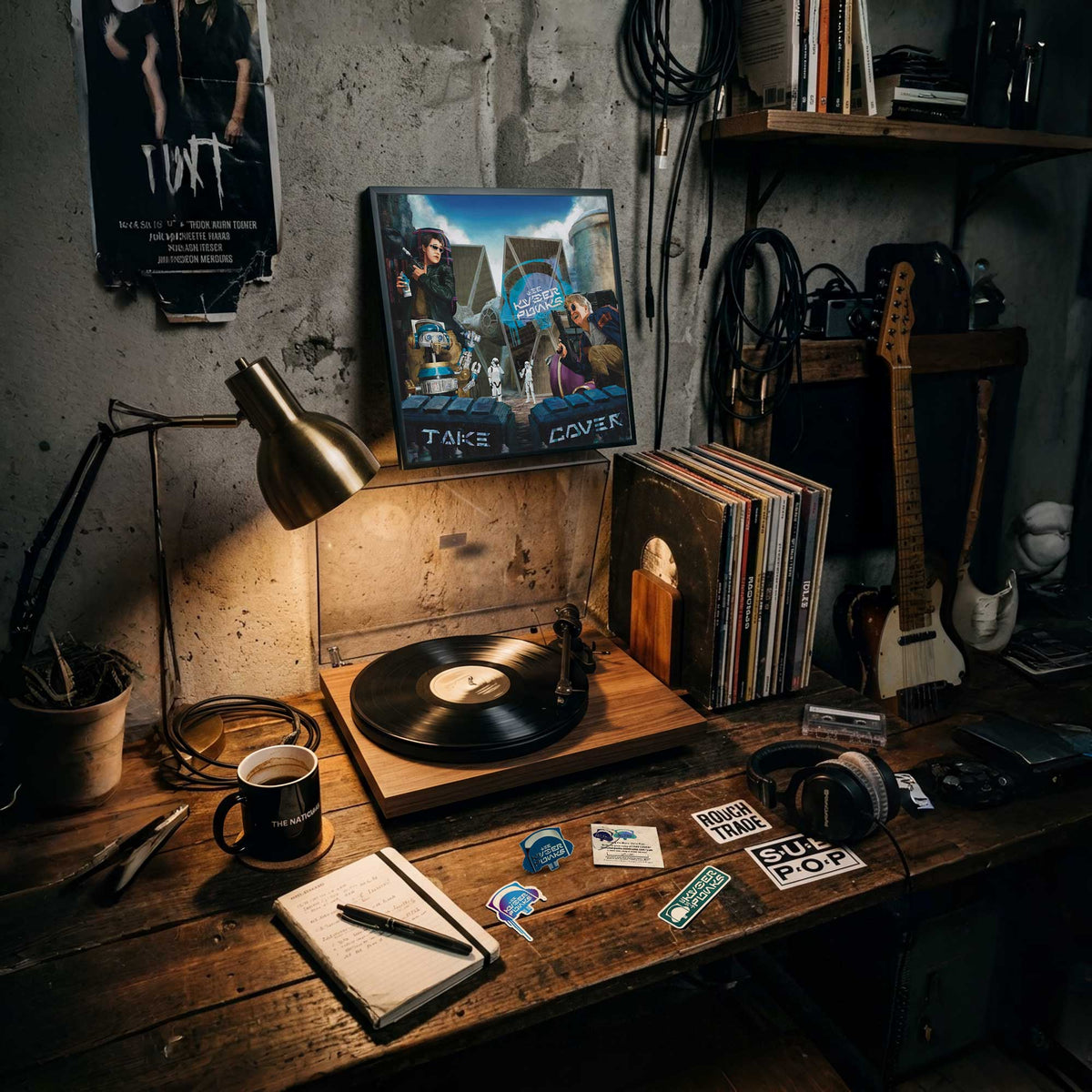Kyberpunks Take Cover album art displayed in music studio with vinyl setup