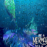 Close-up detail of mermaid art mini puzzle showing glossy puzzle pieces and underwater color texture