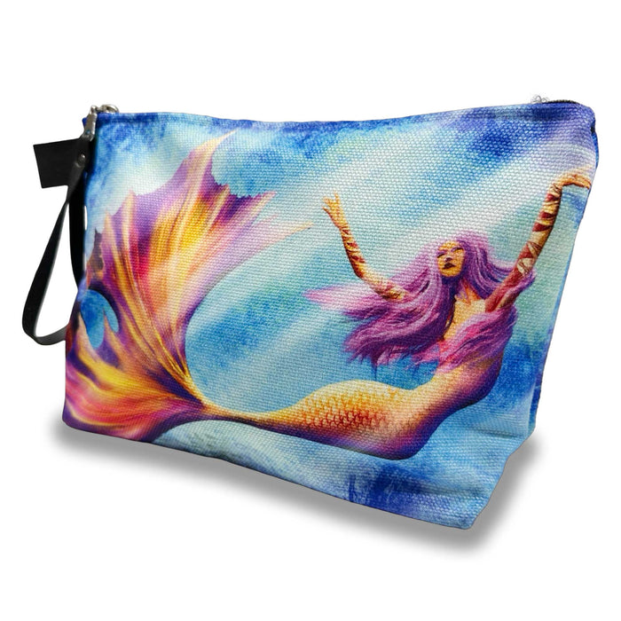 front view of mermaid makeup bag with colorful artwork of a mermaid dancing underwater
