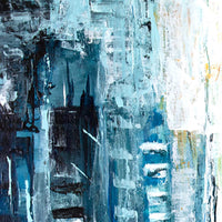 Close up detail of abstract rainy city street with reflective pavement and yellow light glow