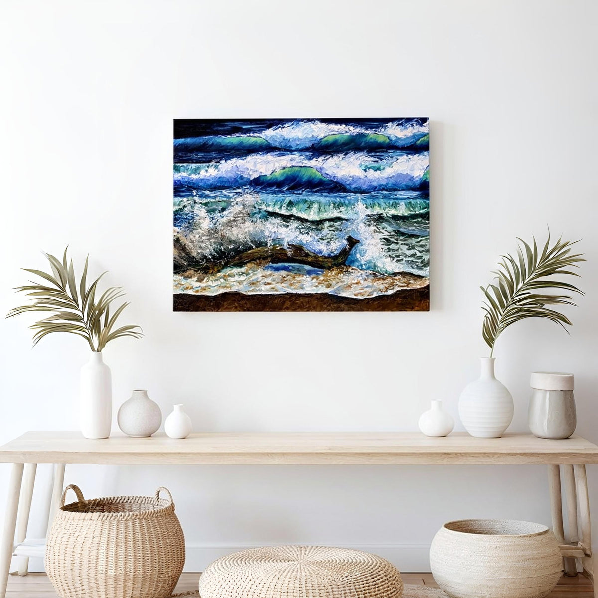coastal wave painting displayed above modern console table