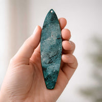 hand painted surfboard ornament held in hand showing small 6 inch size