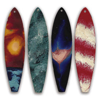 one of a kind hand painted surfboard ornaments shown together