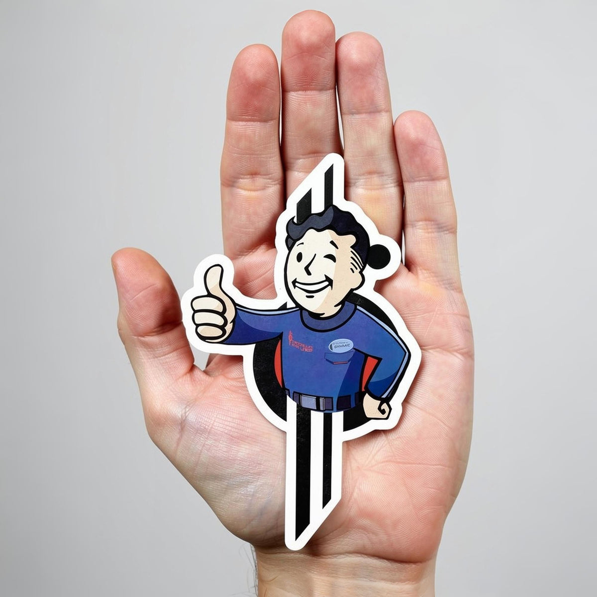 Pip-Boy Sammie die-cut sticker shown in hand for size reference, Star Wars Halcyon fan design.