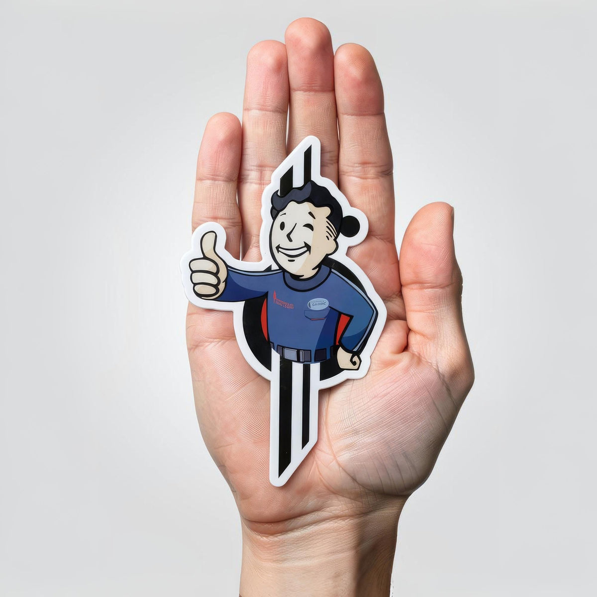 pipboy sammie magnet shown in hand for size reference perfect for laptops water bottles and starcruiser displays