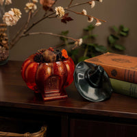 Pumpkin jar Halloween decor filled with seasonal potpourri