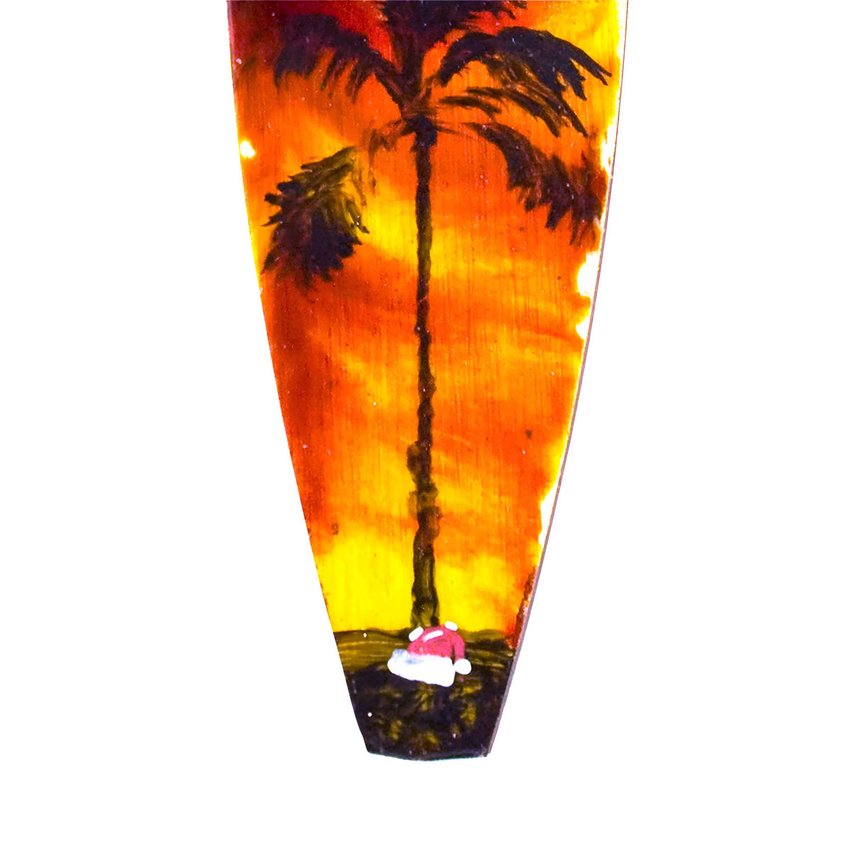 close up of palm tree and santa hat on surfboard holiday ornament