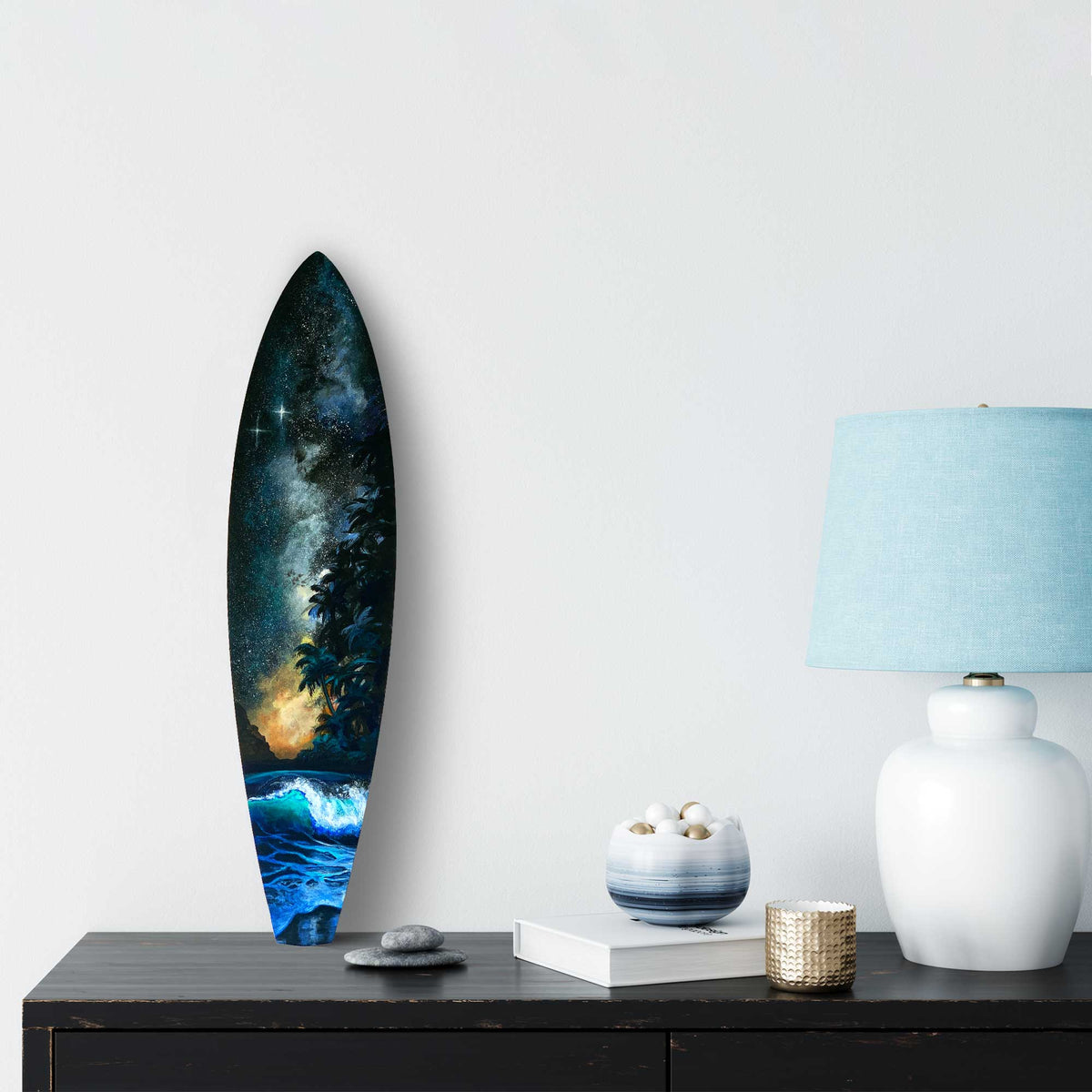 Starshine surfboard wall art displayed in coastal home decor