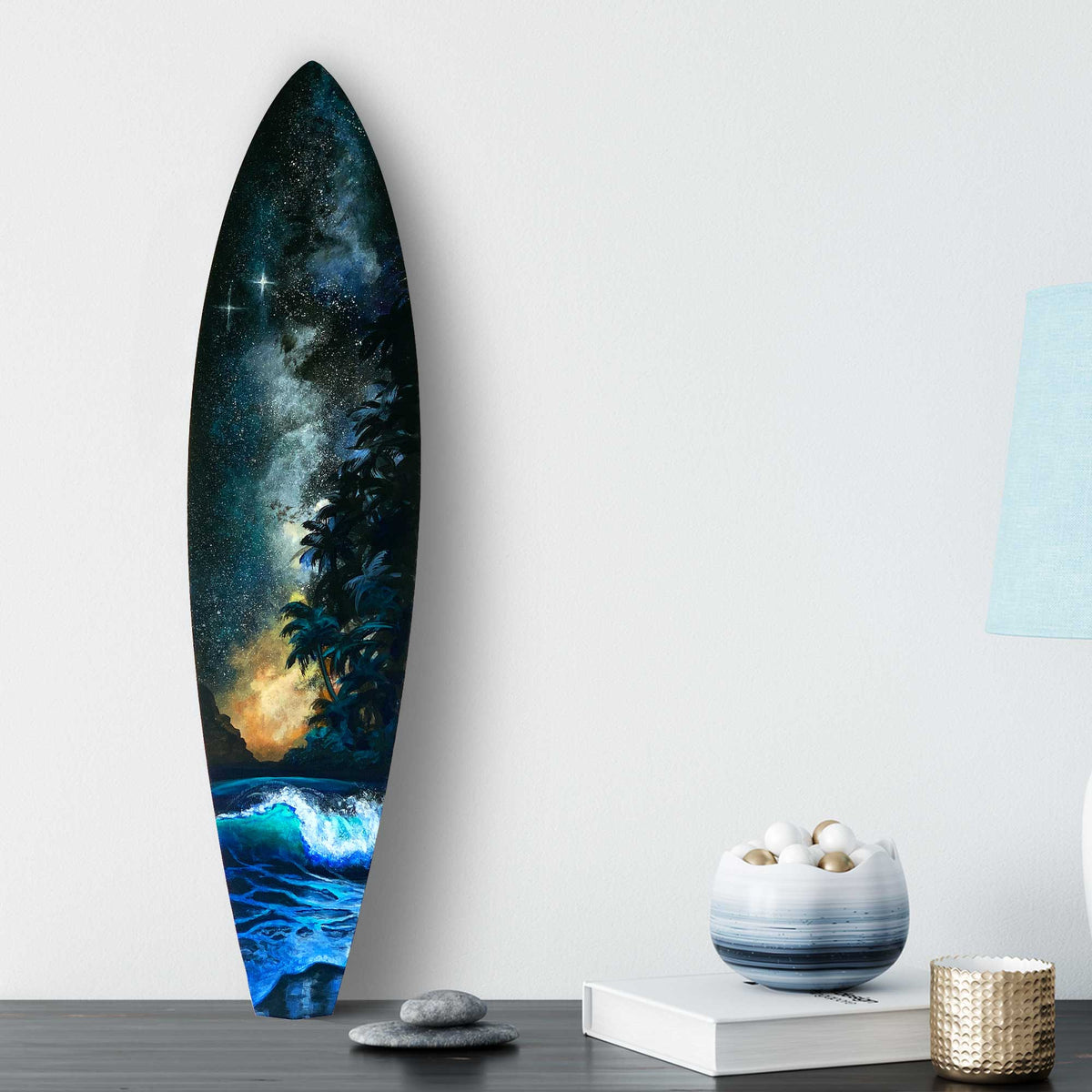 Close up of Starshine surfboard art styled in beach home interior