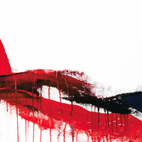 Detail of dripping red paint in expressive abstract artwork