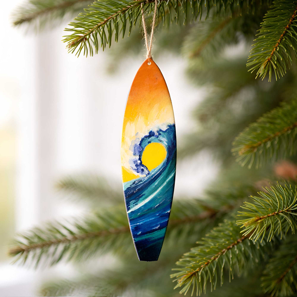 sunrise surfboard ornament hanging on christmas tree