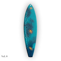 hand painted surfboard ornament with blue and teal pebeo resin and star like gold accents
