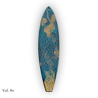 hand painted surfboard ornament with blue and teal pebeo resin and star like gold accents