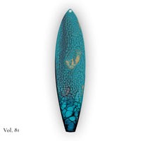 hand painted surfboard ornament with blue and teal pebeo resin and star like gold accents