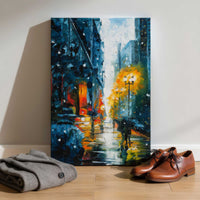 Winter city street canvas art leaning in an urban interior space