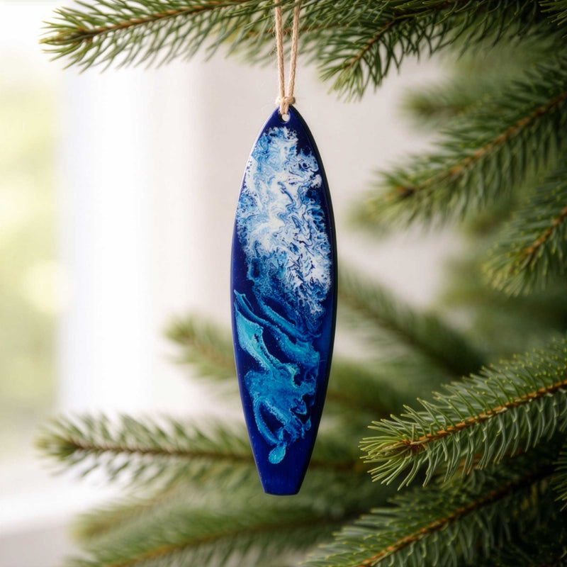 wavecrest surfboard ornament hanging on christmas tree
