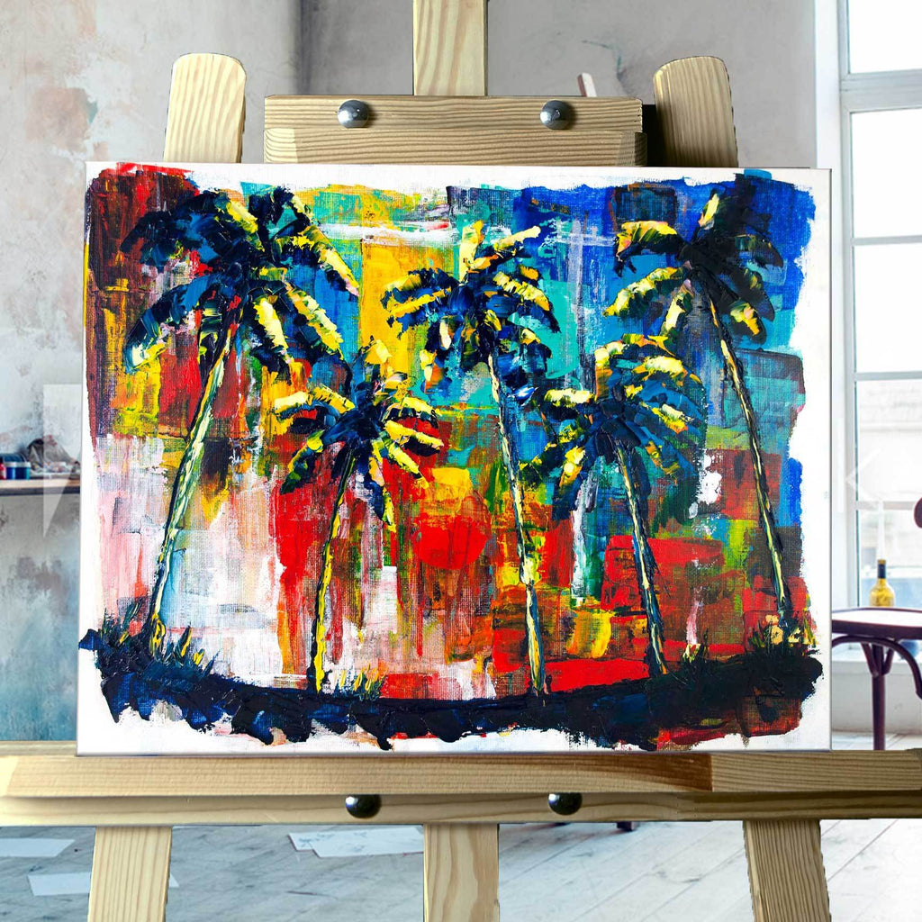 Original painting of abstract black palm trees silhouetted against a colorful rainbow sky