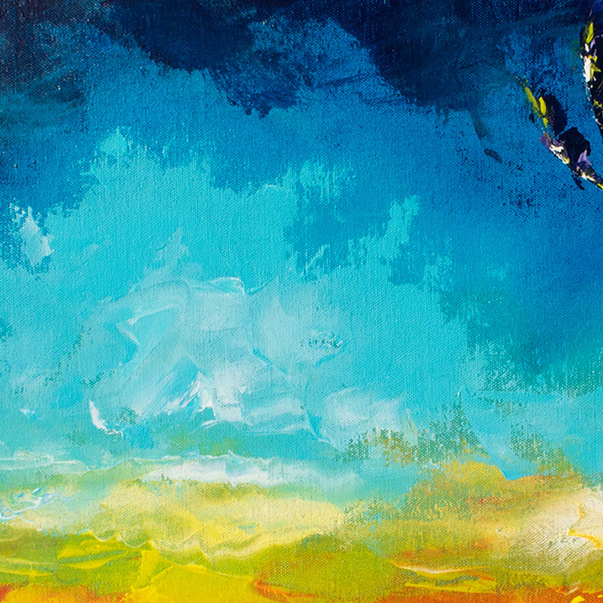 Tropical décor painting of a colorful sunset of navy, blue, orange, and gold over the ocean