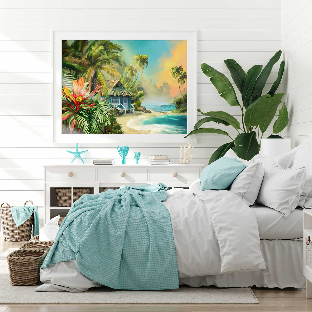 A painting of a tropical paradise hangs on the wall of a beautiful beachy bedroom.