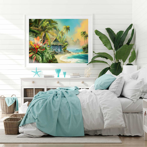 A painting of a tropical paradise hangs on the wall of a beautiful beachy bedroom.