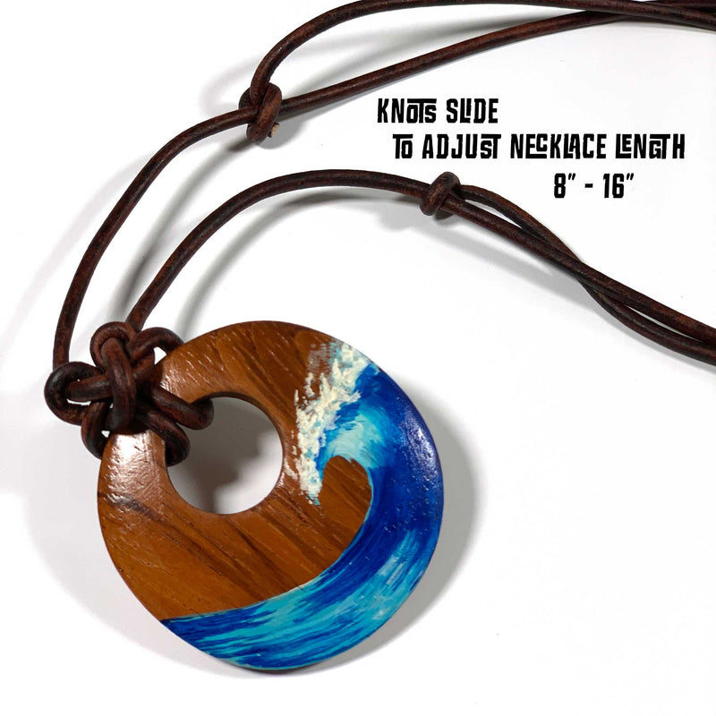 Circle wood pendant necklace with adjustable length leather cord necklace with sliding knots on a white background