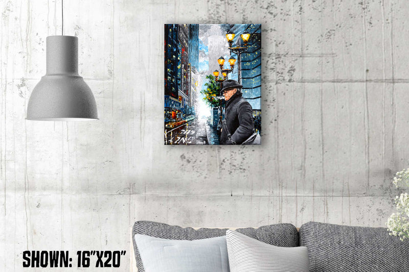 Large urban wall art of blue and gray city street with smoking man walking through the urban landscape