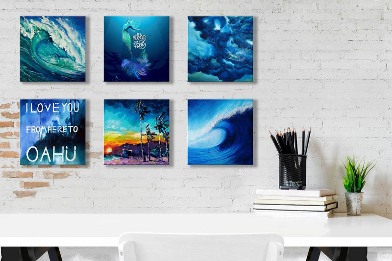 White home office idea with six art tiles of blue waves, tropical beaches, swimming surfers, and mermaids in shades of blue