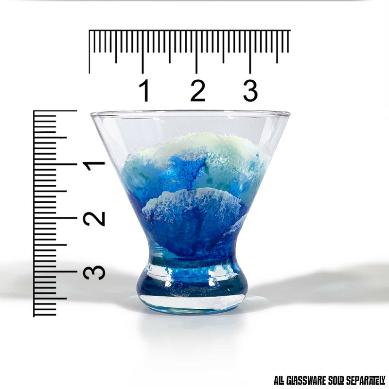 Blue and white nautical martini glass with abstract ocean surf, shown with a ruler for scale.