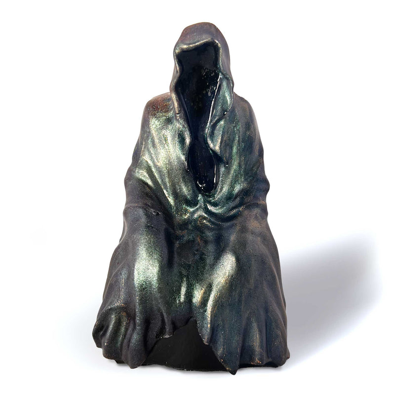 A Grim Reaper statue facing us on a white background.  The Reaper's robes are painted with color shifting paint and dry brushed with a metallic gold paint.