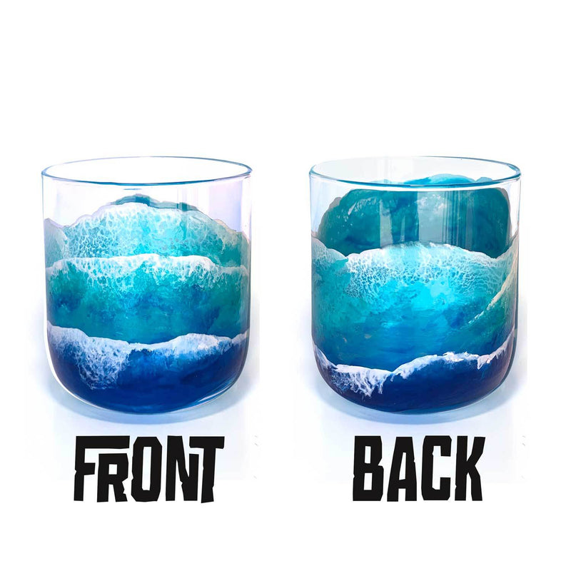 Front and back views of ocean wave lowball glasses, styled as blue and white beach house decor.