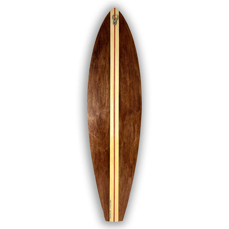 A wooden surfboard on a white background stained with stripes