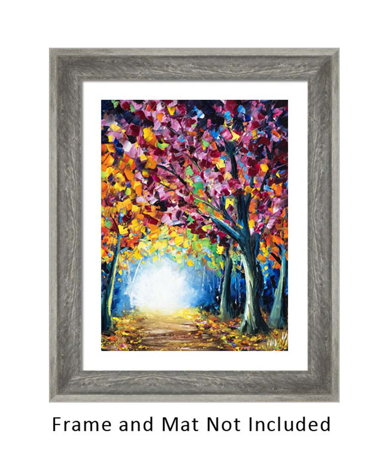 Framed nature wall art of a fall foliage landscape. Colorful foliage lines an inviting forest path in this fall decor for fireplace.