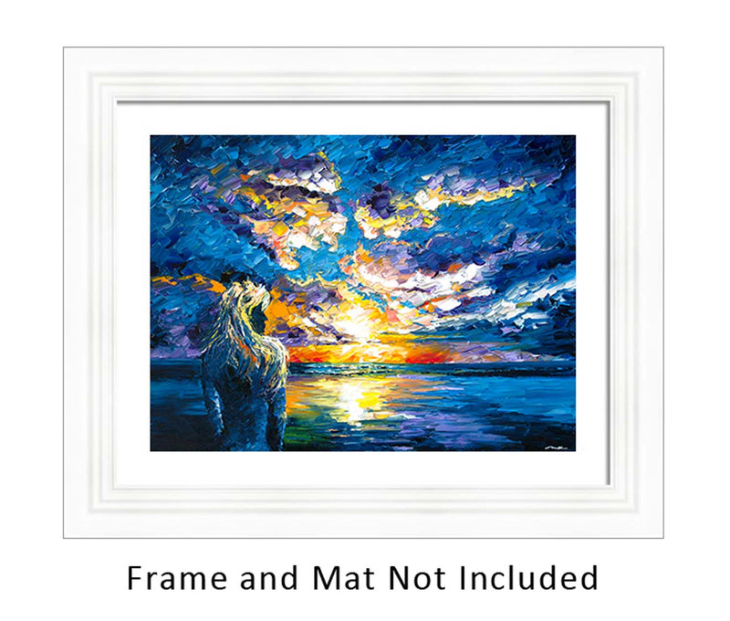 Framed wall art of little mermaid perched on shore, silhouetted against a pastel ocean sunset