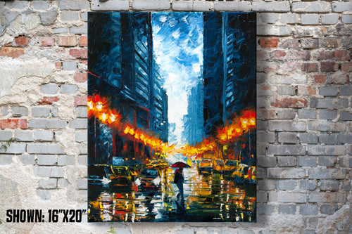 Large printed wall art of rainy New York City street with reflected lights in an urban home office
